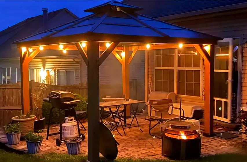 Fire Pit Under A Hardtop Gazebo