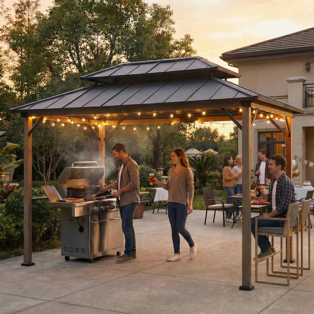 People gathered around a grill under a wooden gazebo with string lights on a patio.