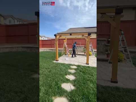 SUNJOY 9x9 Cedar Gazebo with Brown Metal Roof and Ceiling Hook.