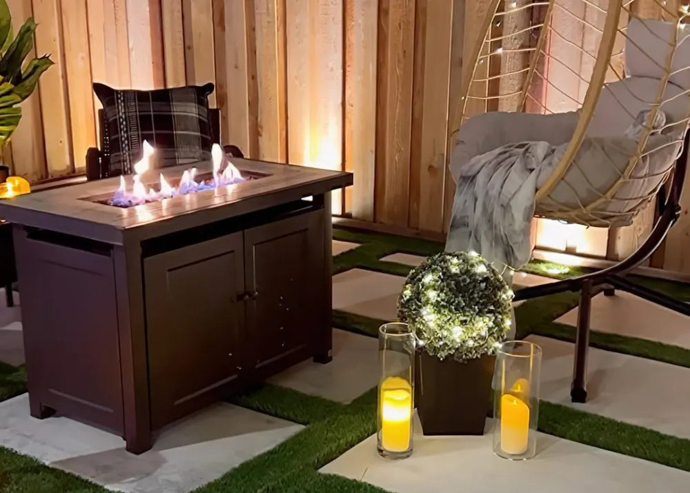A fire pit table at night, enjoying comfort in a rocking chair